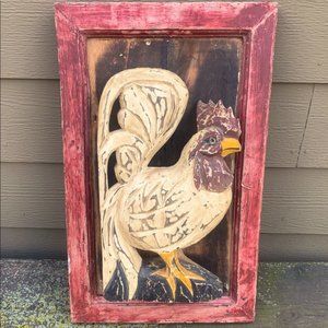 Distressed wood carved Rooster. Standing in relief